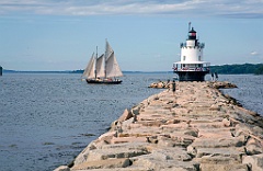 Schooner Passes By Spring Point Lighthouse in Maine